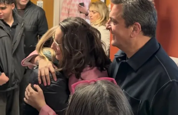 Sergio Massa sonriendo junto a su hija en la graduación