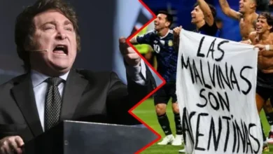 Imagen de la bandera de Malvinas en un estadio lleno de personas