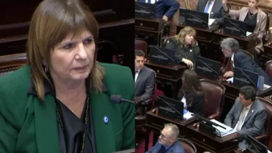 Senador y senadora discutiendo en el Senado